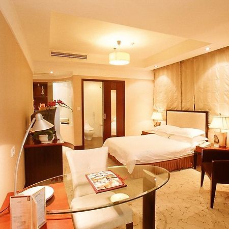 Shanghai Hengsheng Peninsula International Hotel חדר תמונה